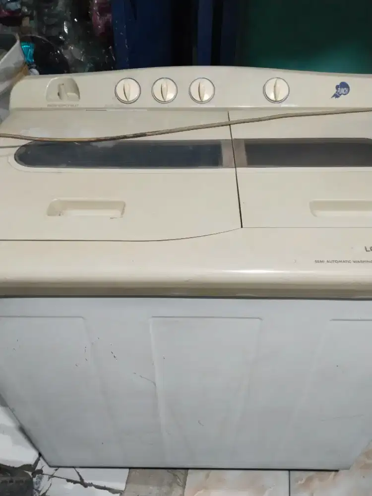 Mesin cuci LG bodi kaleng 9kg