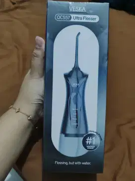 OC557 Ultra Flosser Like New