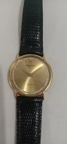 Jam tangan Raymond Weil 18k gold elactroplates.
