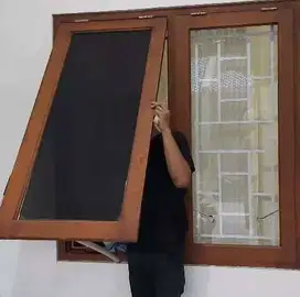 Vendor kaca film cutting stiker rumah sticker kantor sanblast gedung