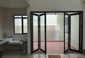 Pintu lipat aluminium kaca