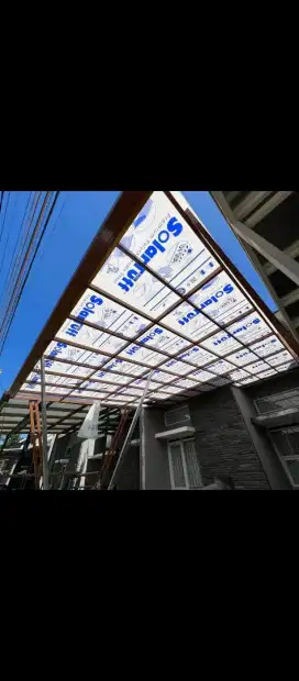 Kanopi rangka hollow galvanis atap solar tuff