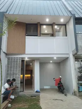 Rumah 2 lantai 3 kamar tidur,dekat pintu toll limo DP ringan