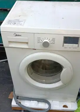 Midea Mesin cuci Pintu Depan Kap 7kg Bekas kondisi perlu service
