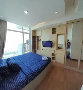 Sewa apartemen harian grand Kamala lagoon bekasi