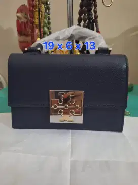 Tas pesta branded 
Tory uk 19 x 6 x 13 
Limited edition 
Barang tera