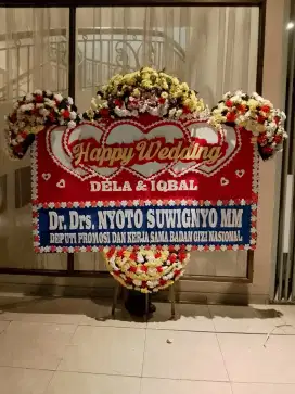 Karangan ucapan bunga papan