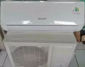 Ac sharp 1/2pk hemat listrik