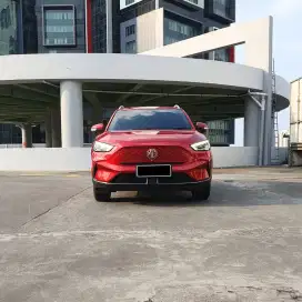 MG Ev listrik type ZS Lux 1500kwh tahun 2024 warna merah