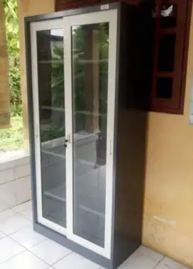 Lemari Besi Pintu Sliding / Swing Kaca Emporium