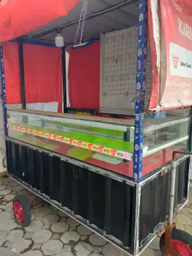 Gerobak jualan pulsa dan peralatan hp dl.. kondisi bagus.