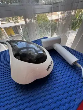 Bundling vacuum cleaner & setrika uap