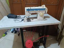 mesin jahit merk singer