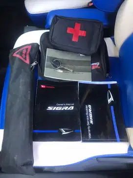 Sigra R Delux A/T