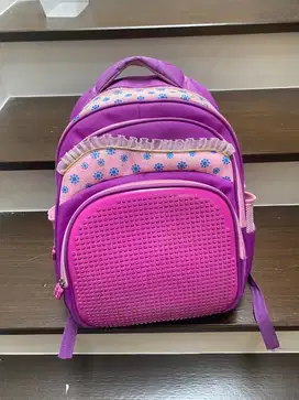 Tas sekolah warna ungu
