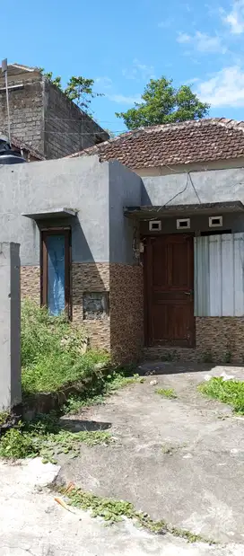 Jual Rumah PERLU Renov 70m2 di Batu Kandik Kebo Iwa Utara