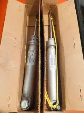 shock gas belakang bmw serie 5