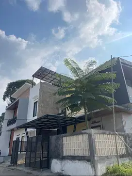 Rasakan Hidup Tenang di Hunian Berkonsep Vila dengan Nuansa Hijau