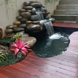 Kolam batu-kolam natural-kolan koi-relif tebing-tukang taman