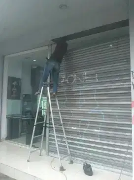 Reparasi servis Rolling door murah