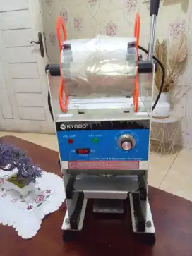 Mesin press cup minuman
