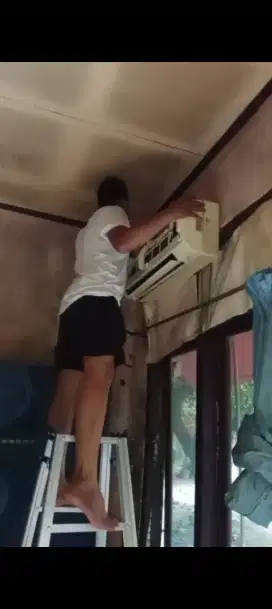 Cuci AC isi service