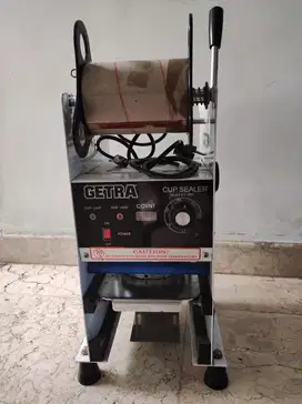 GETRA mesin penyegel gelas cup plastik masih gress