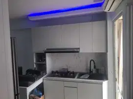DIJUAL 2 KAMAR SEMI FURNISH APARTEMEN BASSURA CITY RP.420JT SHMRS