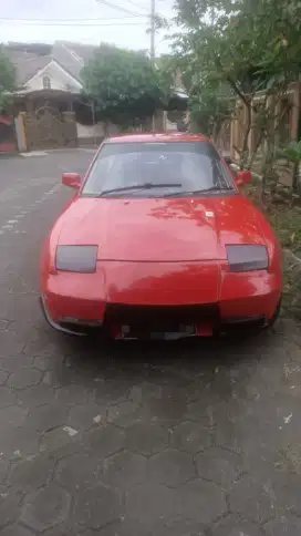 Mazda Astina 1991 MT Merah Siap Pakai No PR