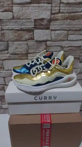 Sepatu basket curry 11 champions