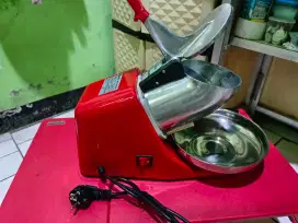 Mesin serut es batu listrik