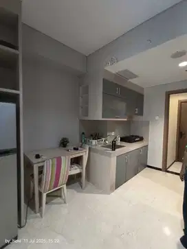 disewakan 1BR furnished Apt. Puri Orchard lt tengah view pool