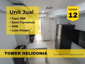 Jual 2BR semi furnished apartemen Bassura City tower Heliconia SHM