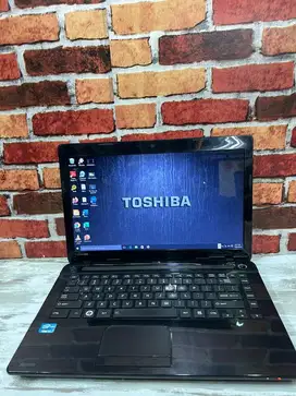 Laptop toshiba hitam murceu