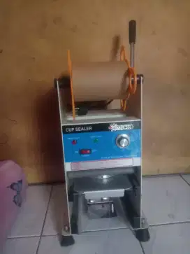 MESIN PRESS CUP SEALER MEREK OMICKO