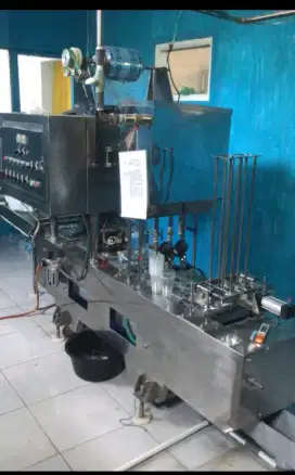Jual mesin cup filling amdk