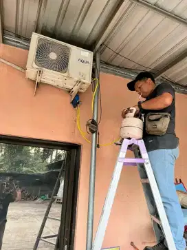 SERVICE AC BONGKAR PASANG AC