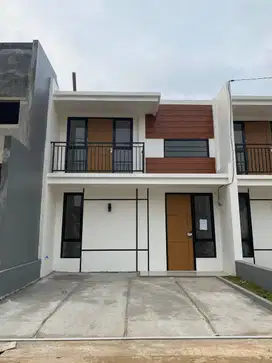 Rumah tampak 2 lantai harga 1 lantai deket stasiun depok lama