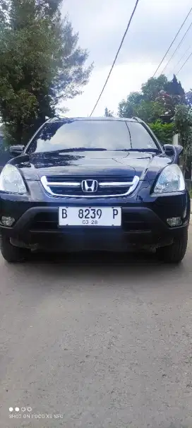 Jual mobil simpanan LOW kilometer HONDA CRV warna HITAM tahun 2003.