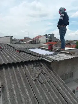 Tukang bangunan,renopasi,perbaikan atap bocor,dag,talang,kanopi,dll