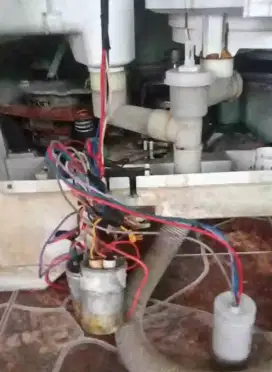 SERVICE MESIN CUCI
