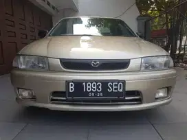 GARANSI MESIN ! MAZDA 323 FAMILIA MT TH 1998 1999