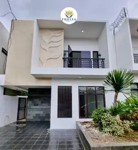 Dipasarkan Rumah dalam Town House dekat Tol Andara