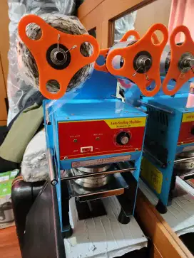 Mesin sealer ice semi otomatis