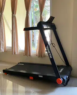 Kinetic motorized treadmill