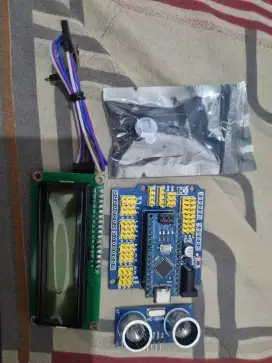 Komponen arduino nano dan ekspansion board, buzzer, sensor hc-sr04