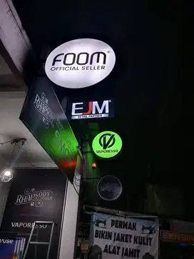 Hurup timbul dan neon box