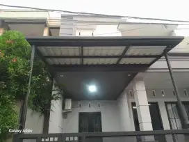 Kanopi besi atap alderon double layar semi transparan