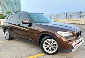 BMW X1 SDrive 18i Tahun 2012 Automatic Coklat metalik KM 40rb