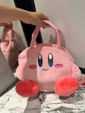 Boneka dan tas ada resleting